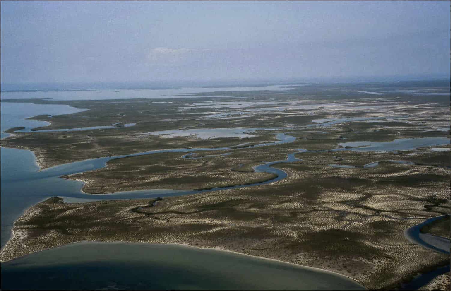 Although the Turks and Caicos Islands has extensive wetland areas, in fact it has one of the largest Ramsar Sites in the region, conditions are dry and humid, making freshwater a scarce natural resource; Copyright: Dr Mike Pienkowski