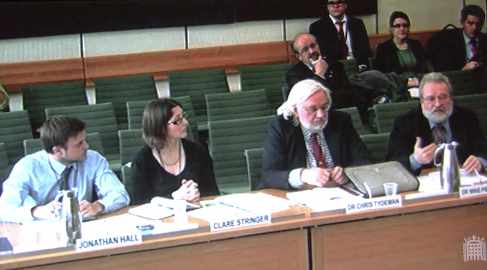 UKOTCF personnel (from right: Dr Mike Pienkowski and Dr Chris Tydeman) give evidence to the Committee, alongside RSPB personnel (Clare Stringer and Jonathan Hall).