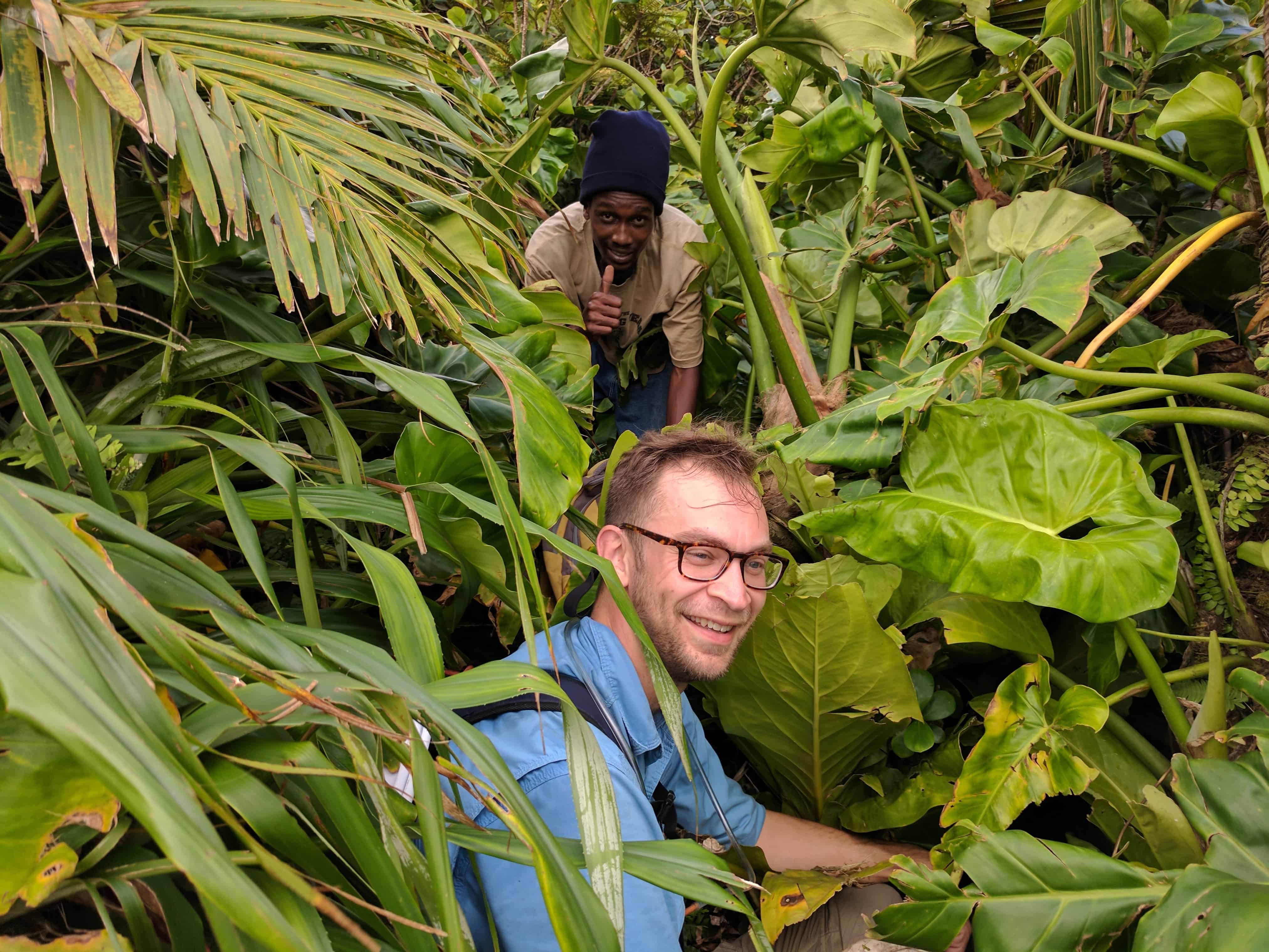 Young Montserratian, Stephon Hixon, leads Montana State University researchers, Frank Etzner and Dr Justin Runyon, to the top of Katy Hill, Montserrat; Copyright: Dr Justin Runyon