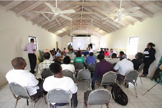 Hon. Claude Hogan opens the EIA workshop at hosted at the Montserrat National Trust offices; Copyright: UKOTCF