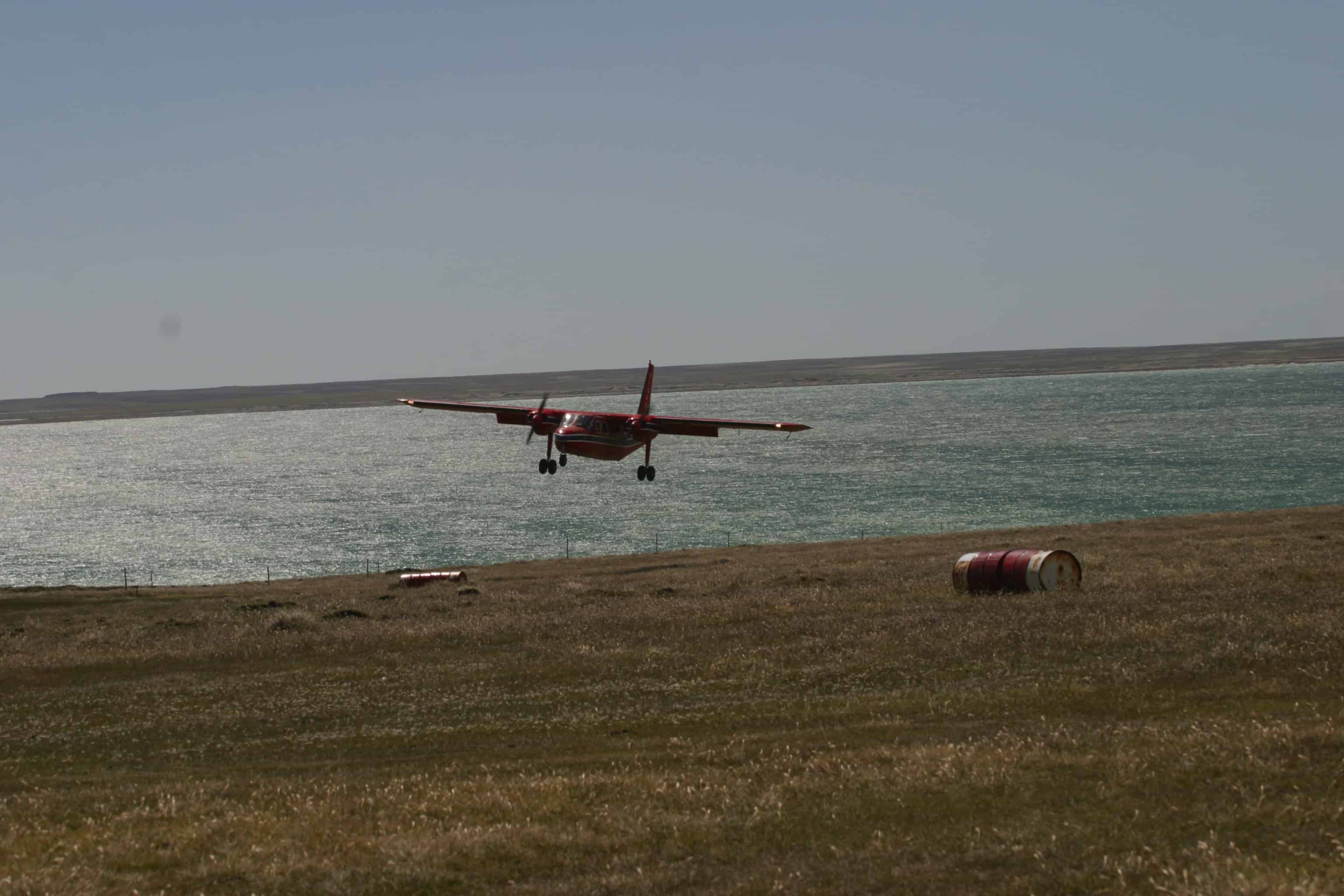 Britten-Norman Islander of Falkland Islands Government Air Service (FIGAS) lands at New Island. Copyright: Dr Mike Pienkowski