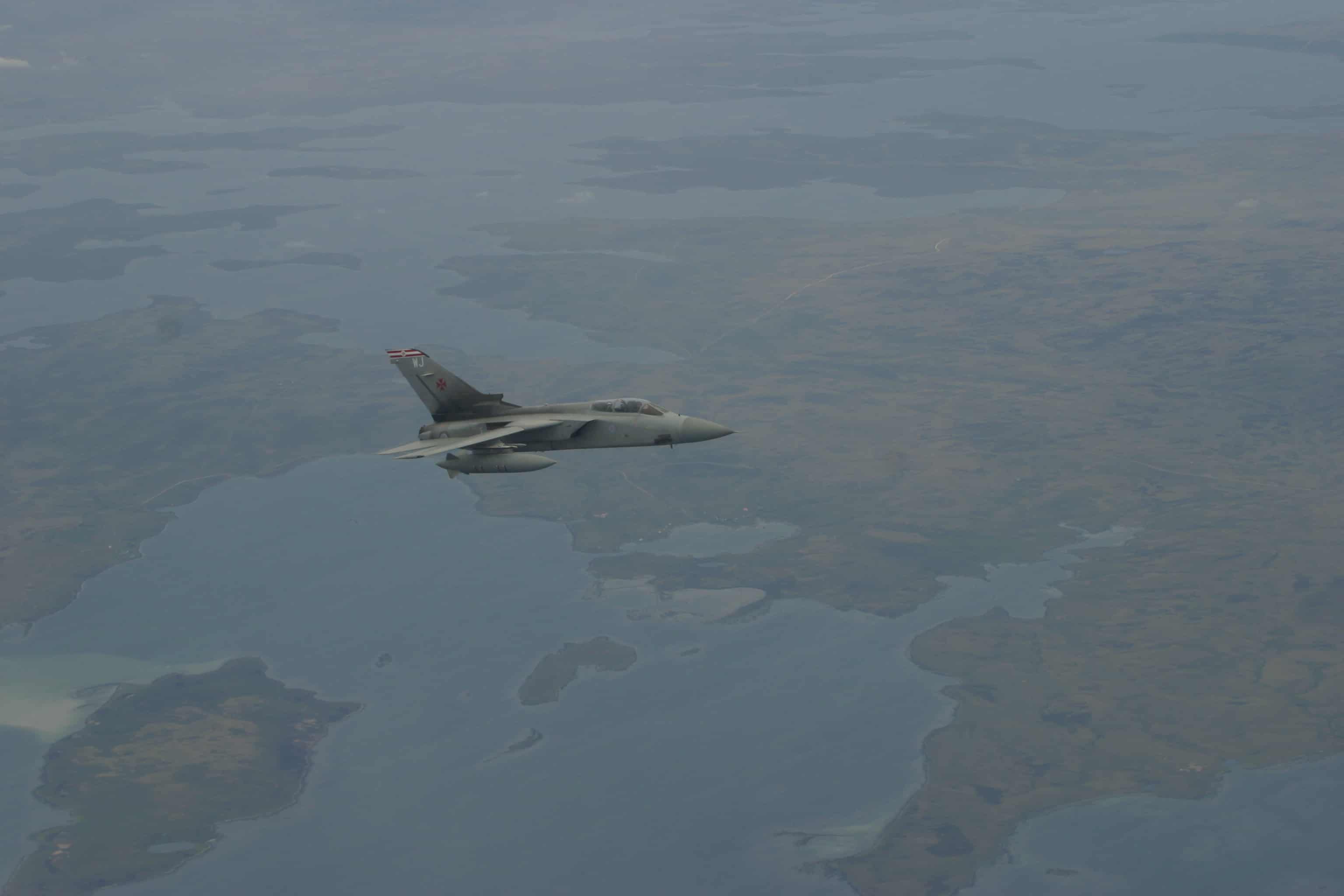 Some of the extensive wetland complexes of the Falklands (with a Royal Air Force Tornado, in the foreground, escorting a departing airliner). Copyright: Dr Mike Pienkowski