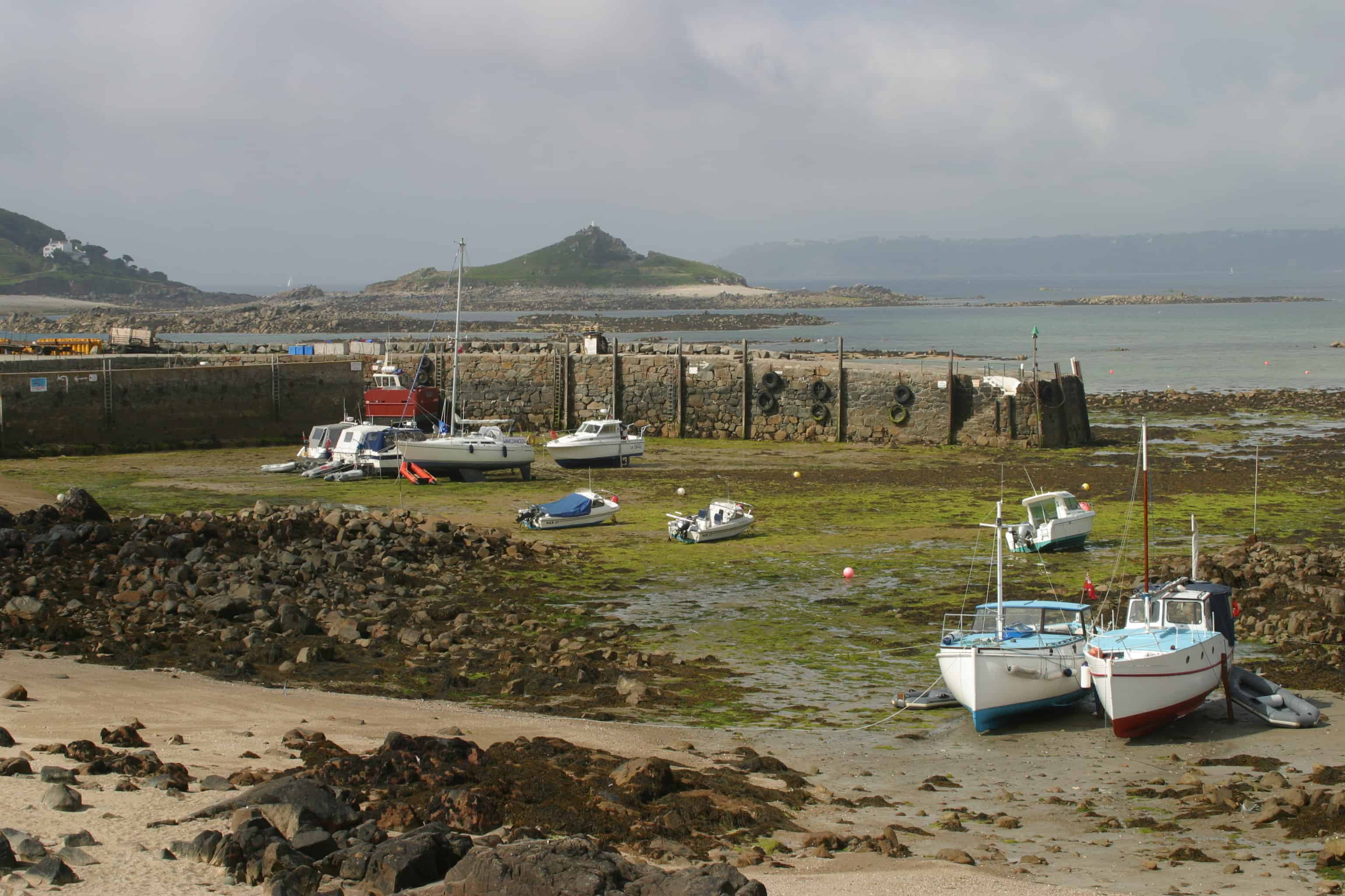 One of the harbours, with boats grounded for much of the tidal cycle, illustrates the huge tidal range of the Channel Islands. Copyright: Dr Mike Pienkowski