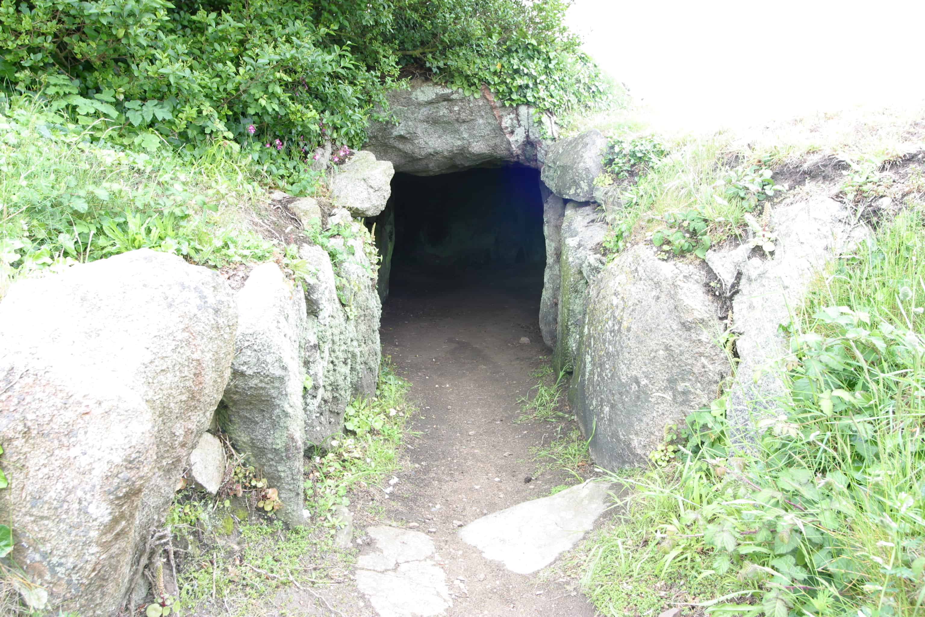 Guernsey has many historic sites, including Le Creux ès Failes, a prehistoric passage grave, built during the Neolithic period (3000 to 2500 BC) and in use until the Late Bronze Age (ca 1000 BC). The grave is 9 m long, with the entrance shown above; Copyright Dr Mike Pienkowski