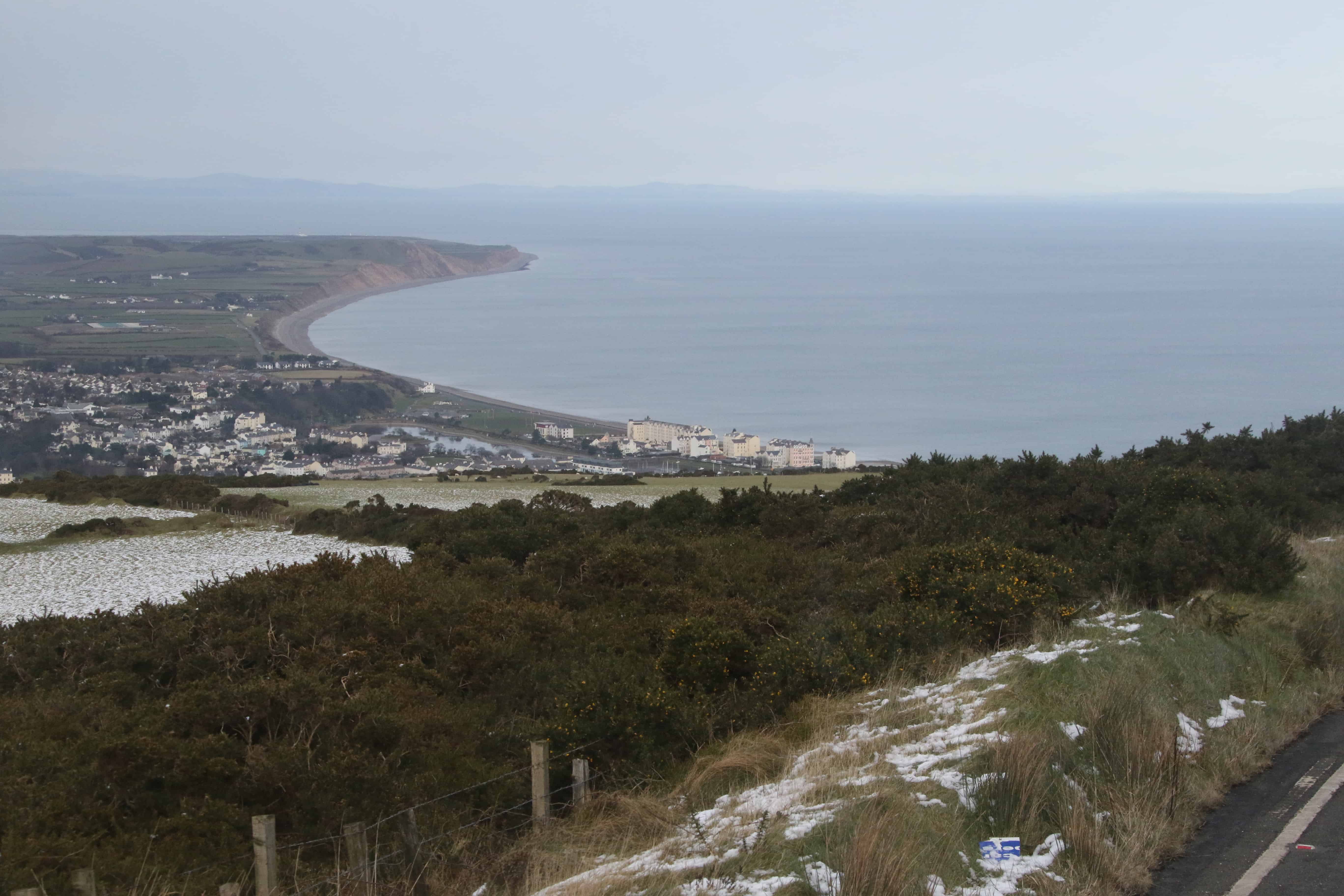 View from the hills northward, over Ramsey, to (on the left) the lowland dune, marsh and fields of The Ayres, and (on the right) the protected marine area of Ramsey Bay. Copyright: Dr Mike Pienkowski