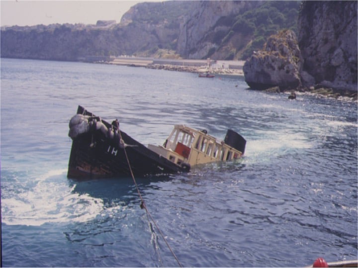 Sinking specially cleaned boat to form artificial reef. Copyright: HMGOG/GONHS