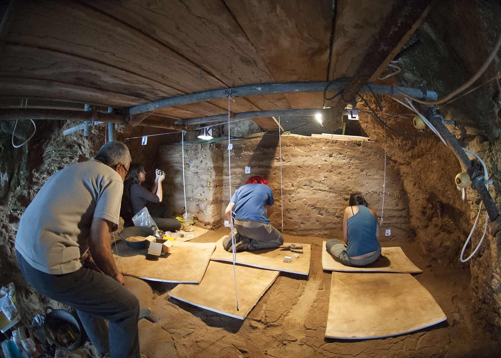 Entrance to Gorham's Cave (above left) and part of the excavations in Vanguard Cave which have revealed fascinating discoveries about Homo neanderthalensis: Copyright: J.C Finlayson/The Gibraltar Museum