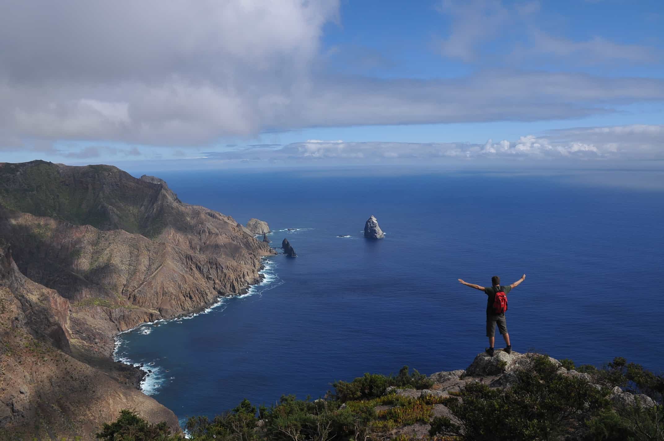 Felix takes a moment to admire view at Horsecliff on St Helena between survey work with the St Helena National Trust