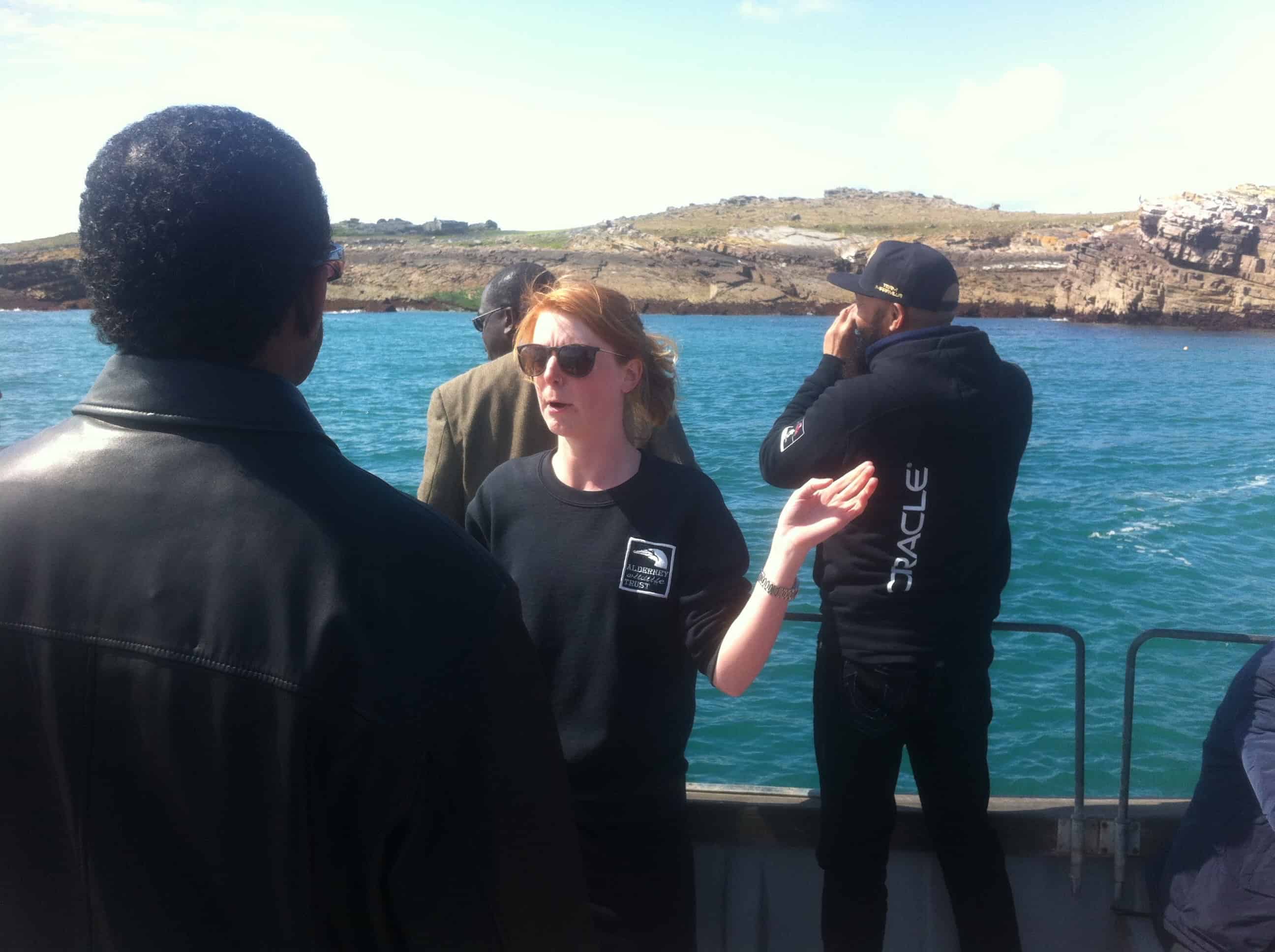 AWT Officer, Claire Thorpe, shows Environment Ministers the puffin colony on Burhou - Copyright: UKOTCF